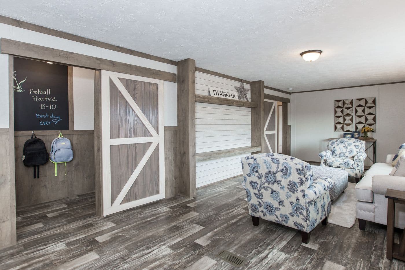 The THE BREEZE 2.5 Living Room. This Manufactured Mobile Home features 4 bedrooms and 2 baths.