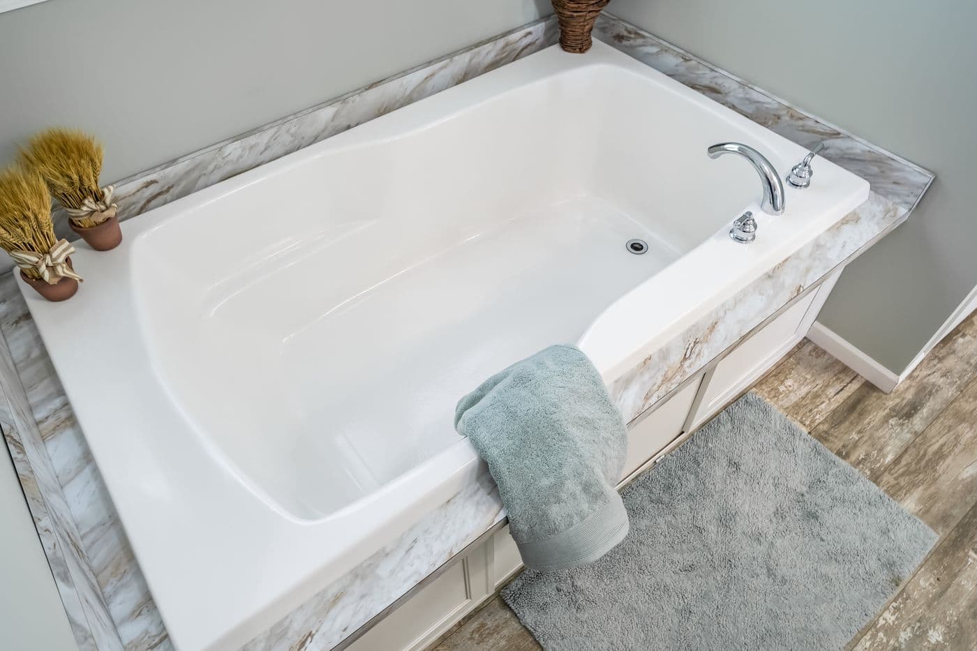 The THE INGRAM Primary Bathroom. This Manufactured Mobile Home features 3 bedrooms and 2 baths.