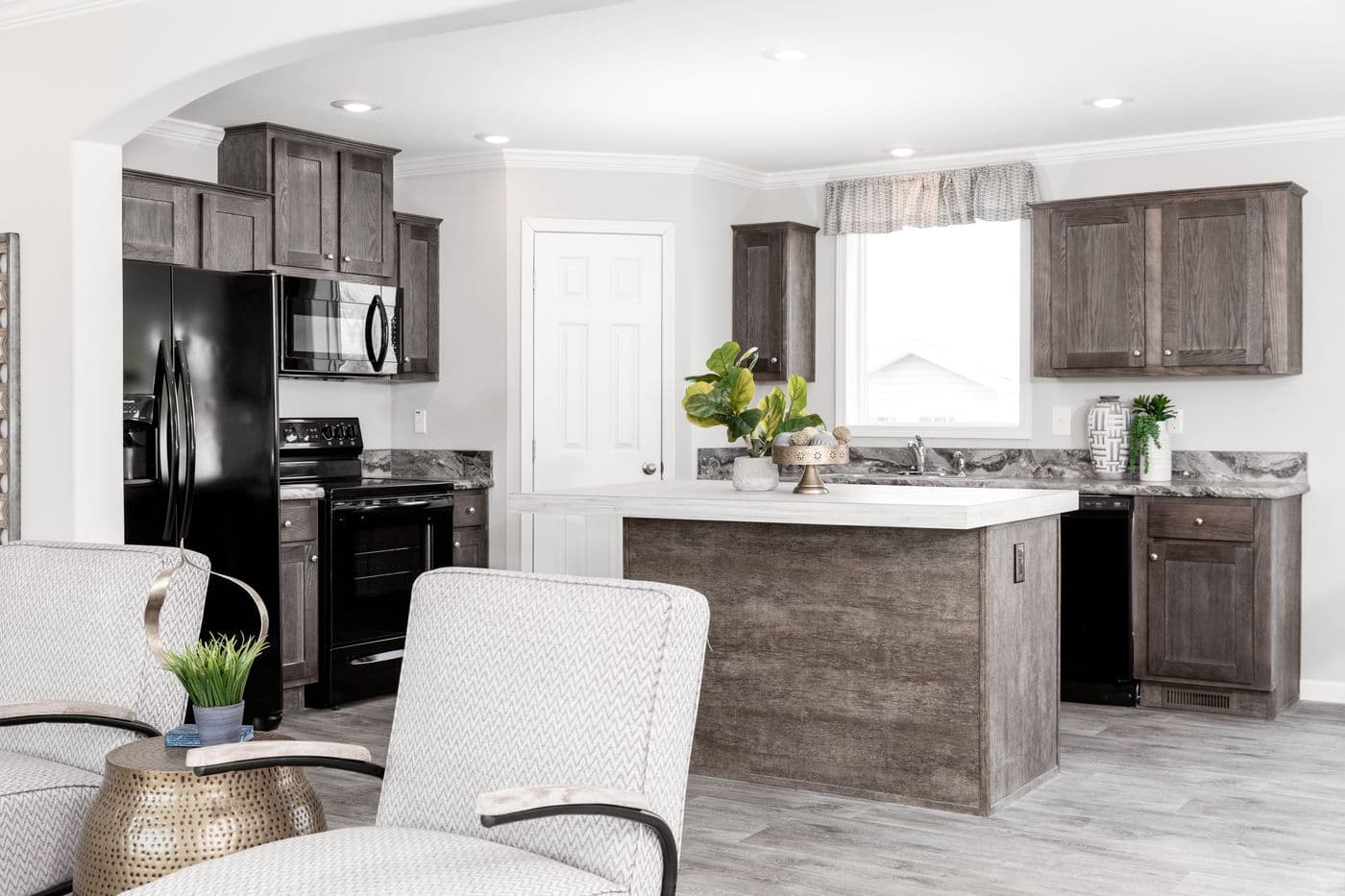 The THE VILLETTE Kitchen. This Manufactured Mobile Home features 3 bedrooms and 2 baths.