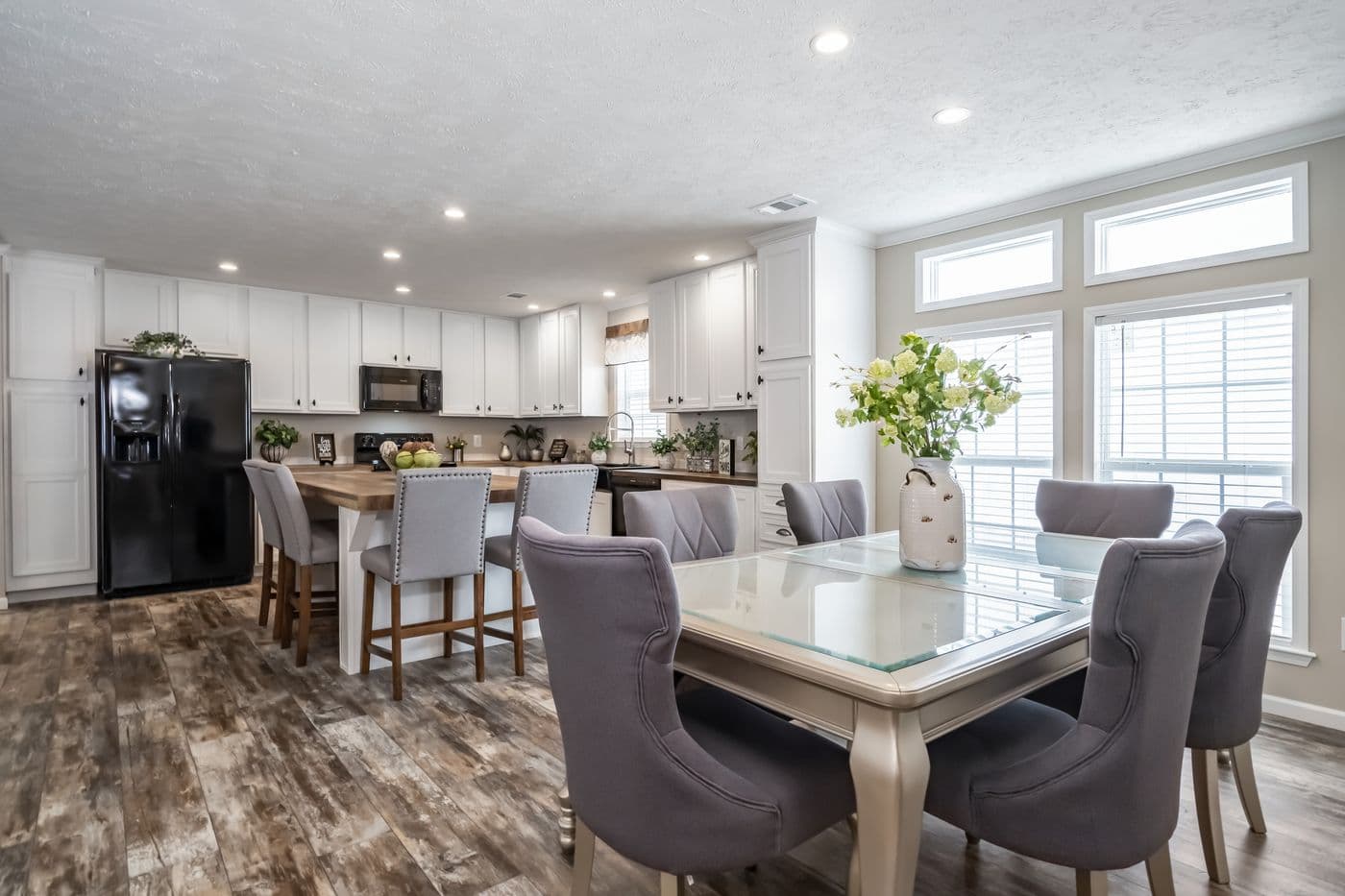 The THE JEFFERSON Dining Area. This Manufactured Mobile Home features 3 bedrooms and 3 baths.