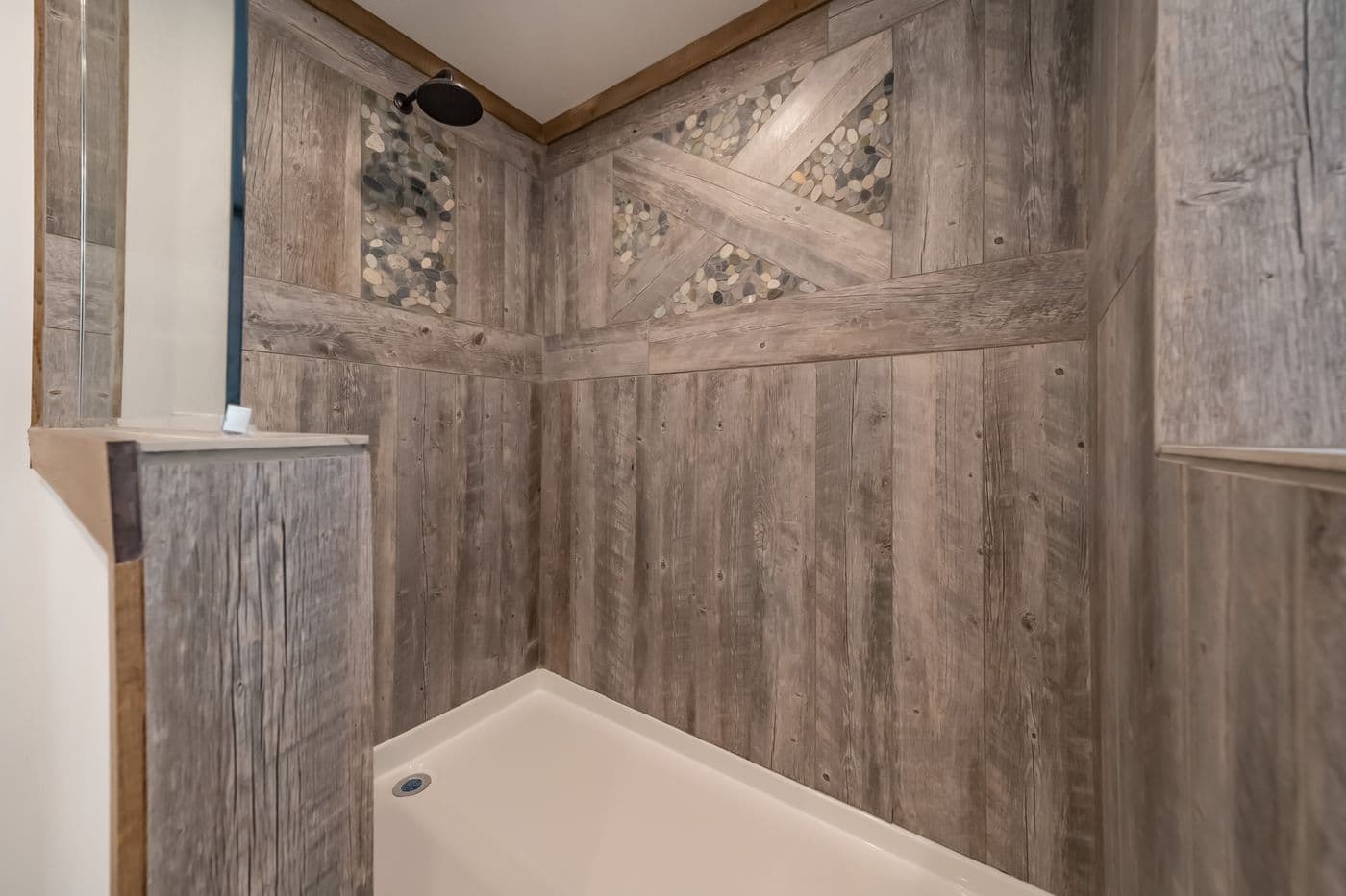 The THE EMMA JEAN Primary Bathroom. This Manufactured Mobile Home features 4 bedrooms and 3 baths.