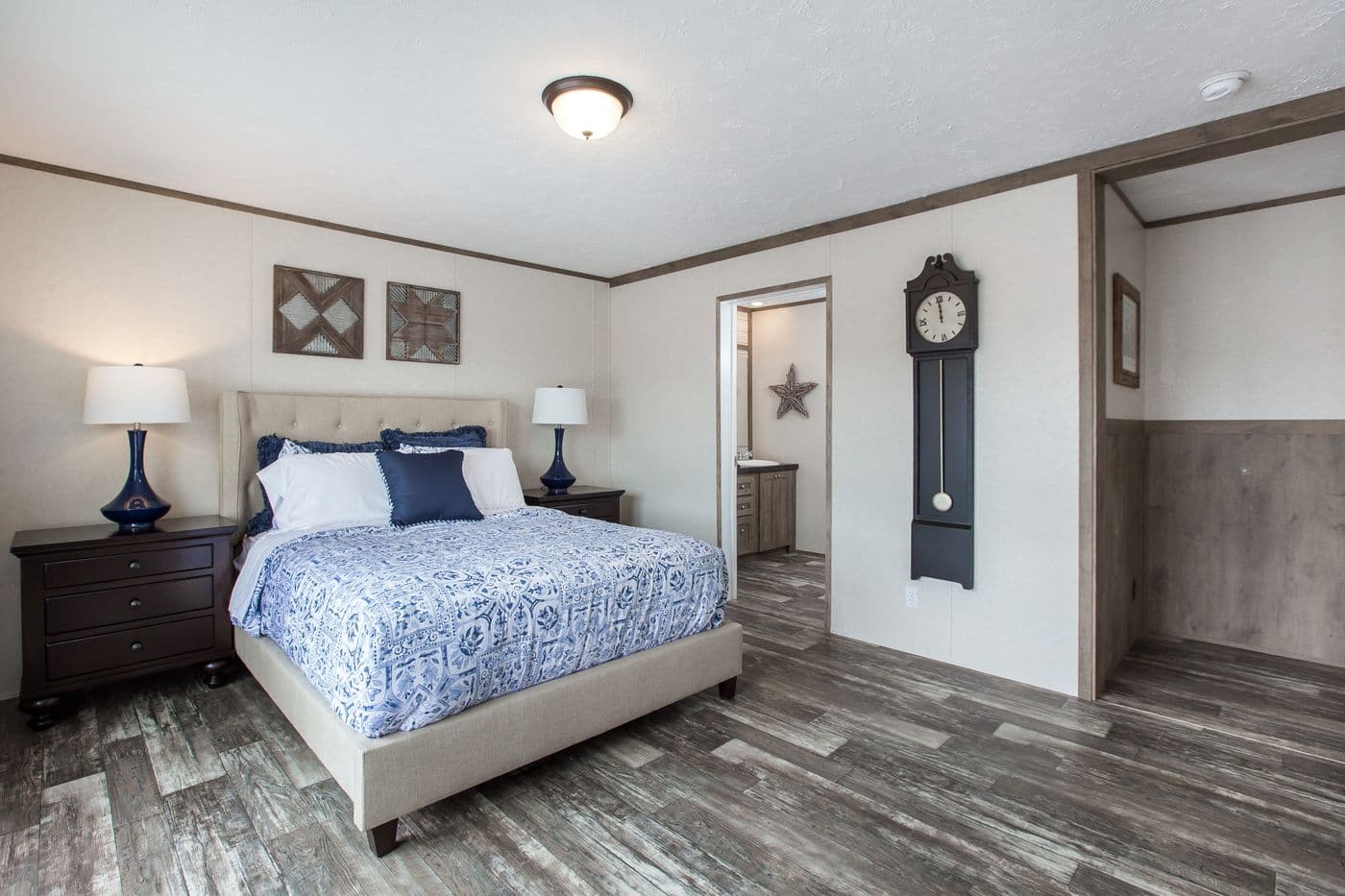 The THE BREEZE 2.5 Primary Bedroom. This Manufactured Mobile Home features 4 bedrooms and 2 baths.