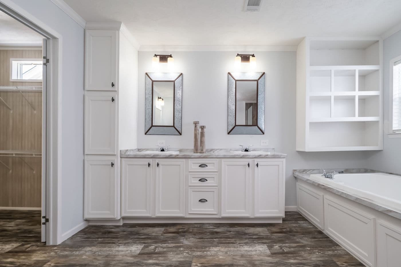 The THE LEAHY Primary Bathroom. This Manufactured Mobile Home features 4 bedrooms and 2 baths.