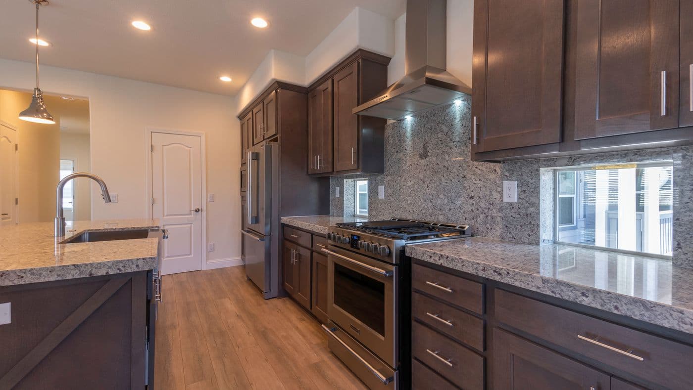 The CORONADO 2456B Kitchen. This Manufactured Mobile Home features 3 bedrooms and 2 baths.