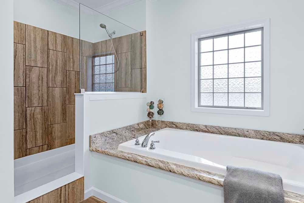 The THE TILLEY Primary Bathroom. This Manufactured Mobile Home features 3 bedrooms and 2 baths.