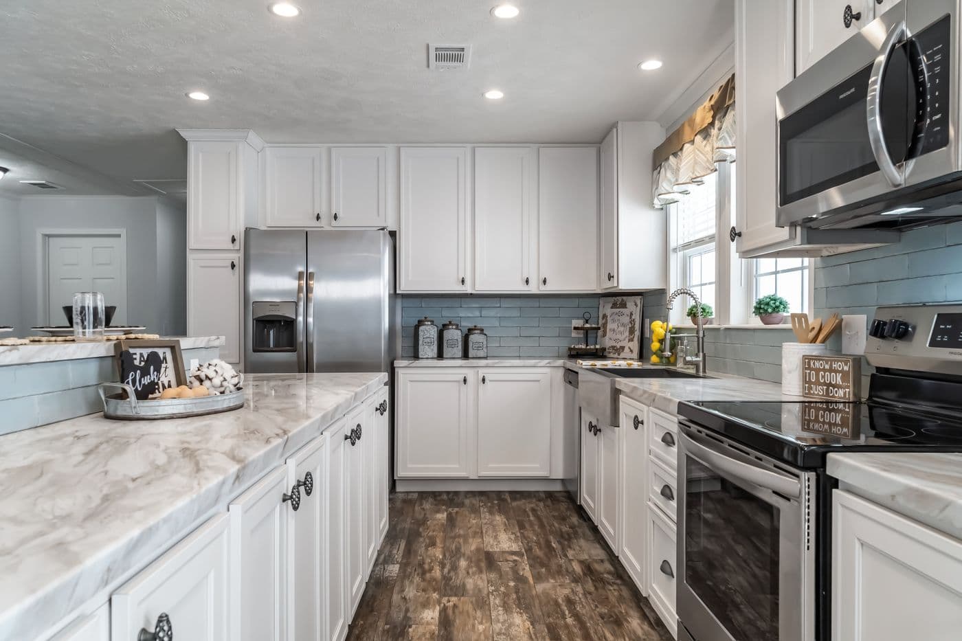 The THE LEAHY Kitchen. This Manufactured Mobile Home features 4 bedrooms and 2 baths.