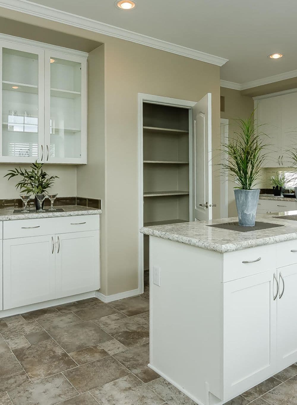 The TRANQUILITY TR3062A Kitchen. This Manufactured Mobile Home features 3 bedrooms and 2 baths.