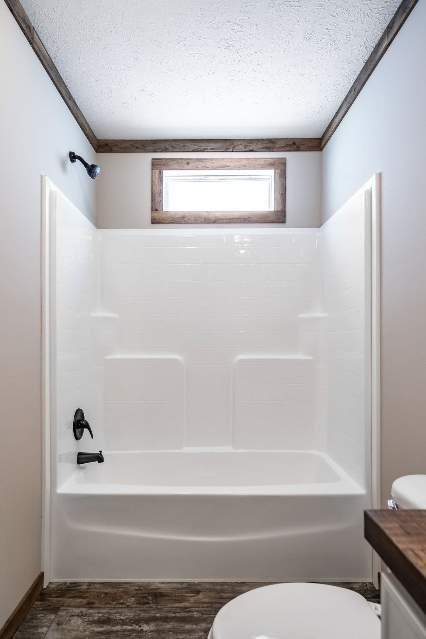 The THE BOBBY JO Guest Bathroom. This Manufactured Mobile Home features 3 bedrooms and 2 baths.