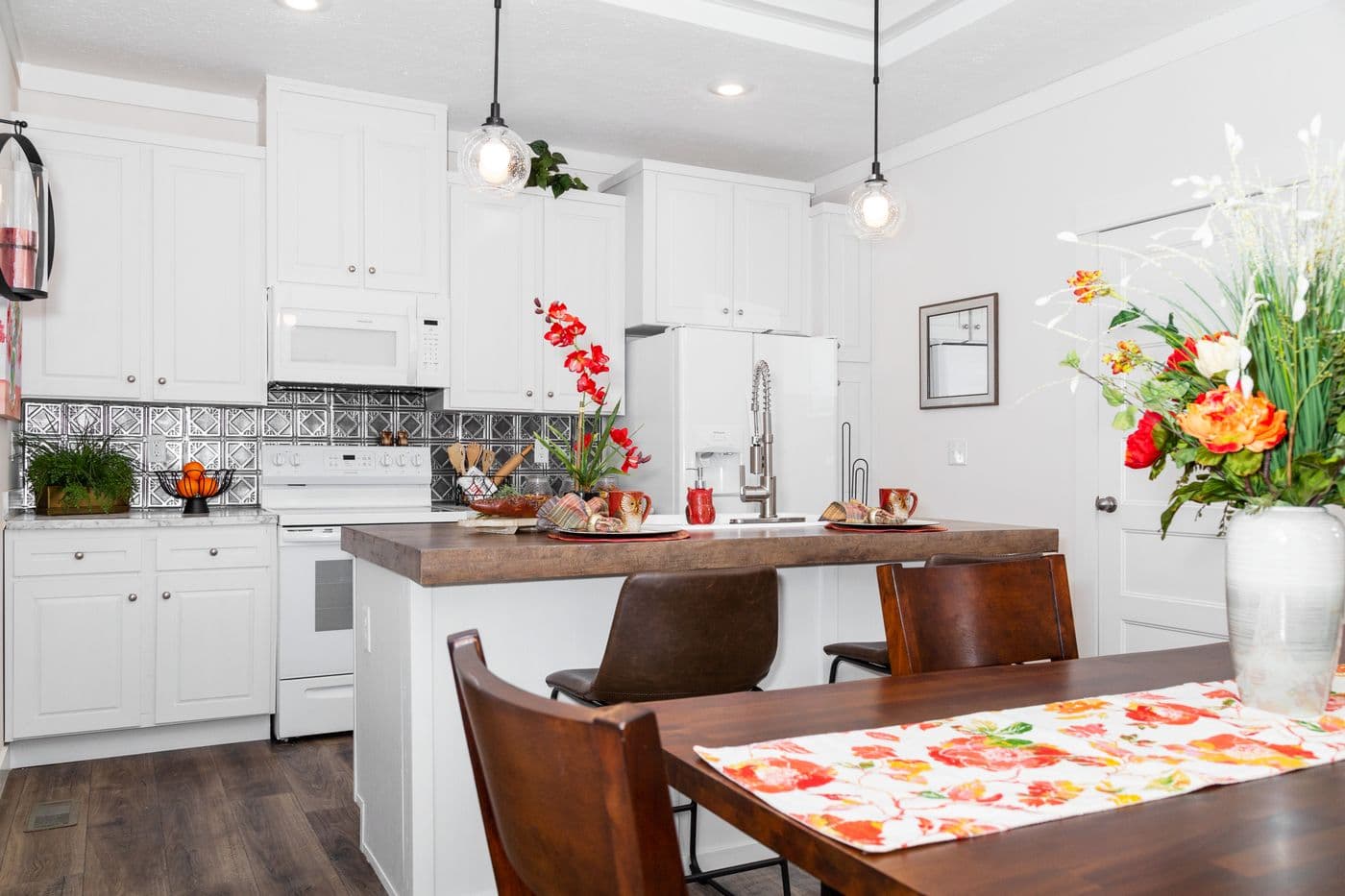 The 1439 CAROLINA "MAGNOLIA" Kitchen. This Manufactured Mobile Home features 3 bedrooms and 2 baths.