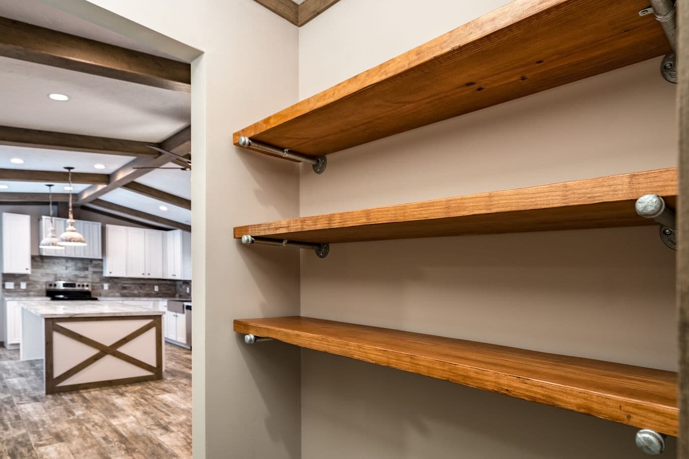 The THE BOBBY JO Kitchen. This Manufactured Mobile Home features 3 bedrooms and 2 baths.