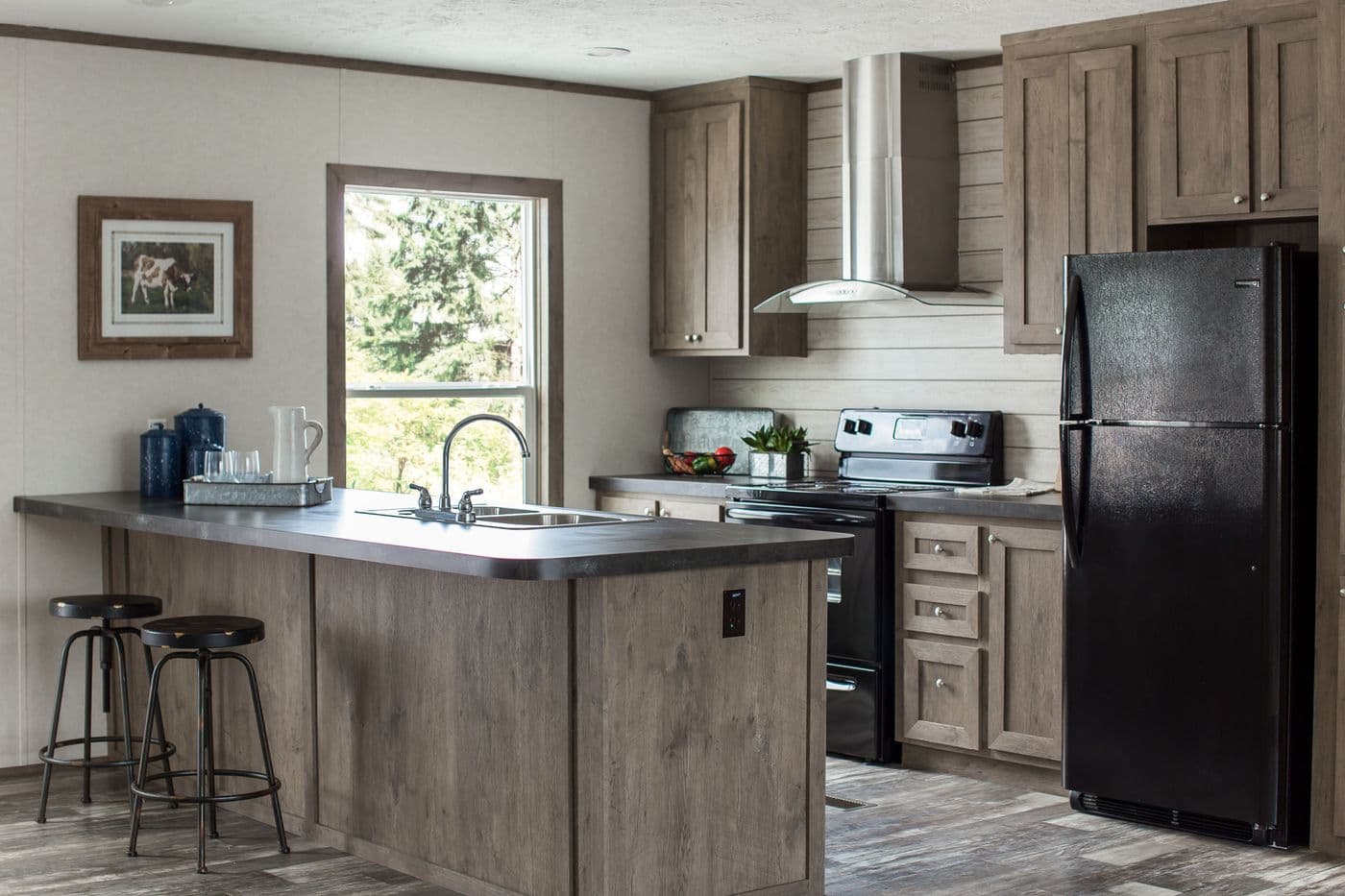 The THE BREEZE 2.5 Kitchen. This Manufactured Mobile Home features 4 bedrooms and 2 baths.