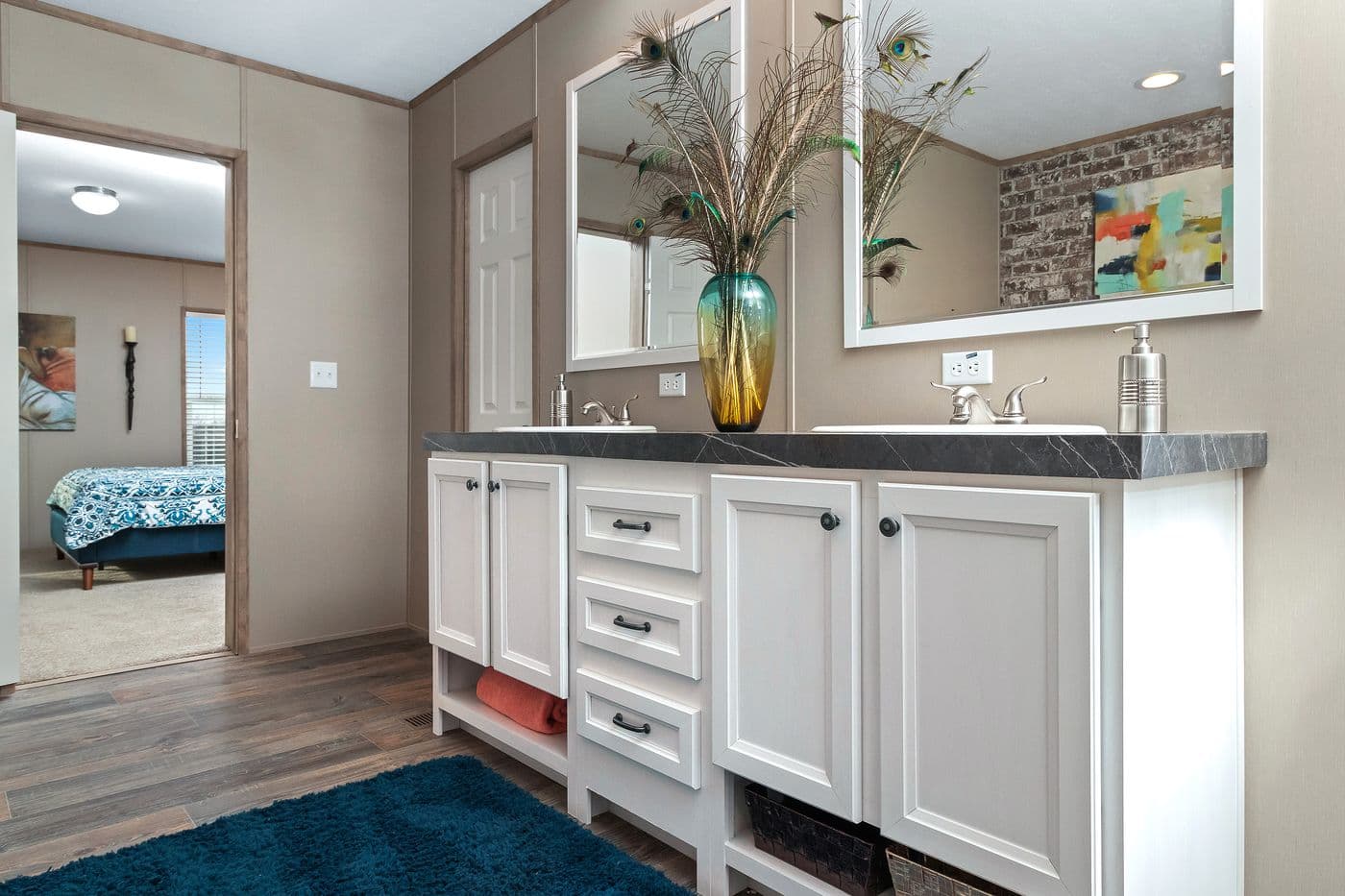 The FARMHOUSE FLEX Primary Bathroom. This Manufactured Mobile Home features 3 bedrooms and 2.5 baths.