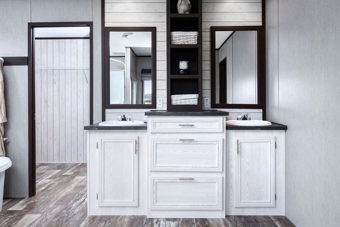 The SIG28663A Primary Bathroom. This Manufactured Mobile Home features 3 bedrooms and 2 baths.