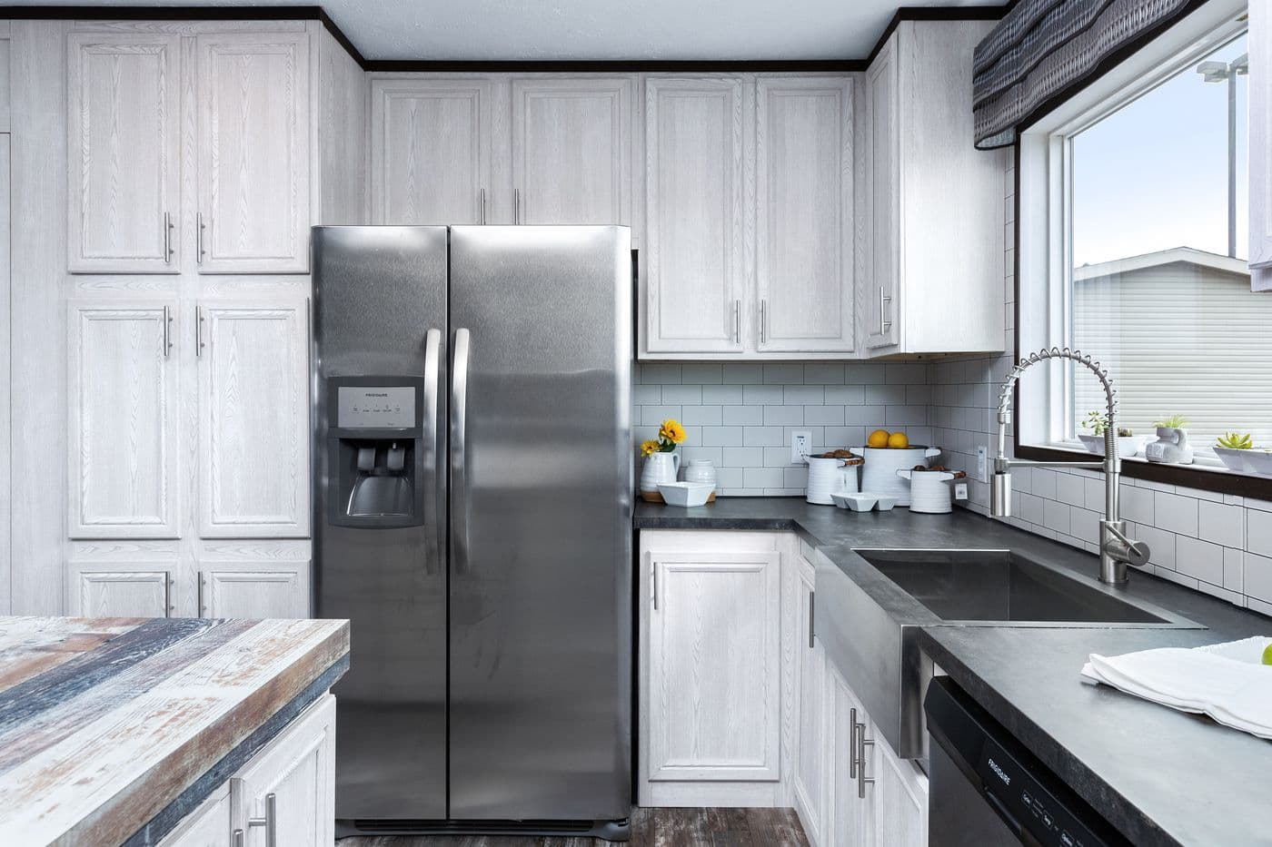 The SIG28663A Kitchen. This Manufactured Mobile Home features 3 bedrooms and 2 baths.
