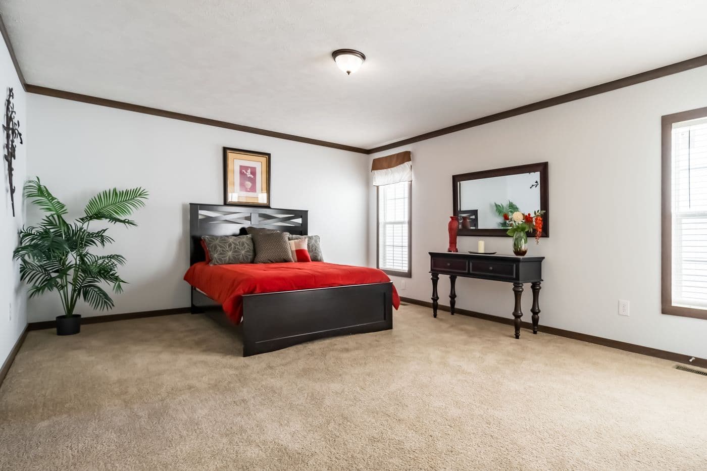 The THE TURNER Primary Bedroom. This Manufactured Mobile Home features 3 bedrooms and 2 baths.