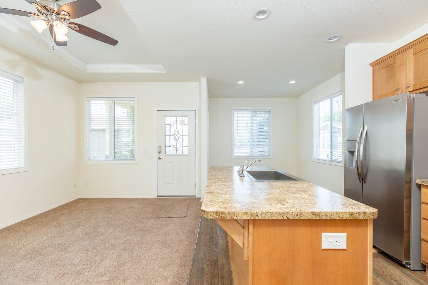 The FAIRPOINT 20523B Living Room. This Manufactured Mobile Home features 3 bedrooms and 2 baths.