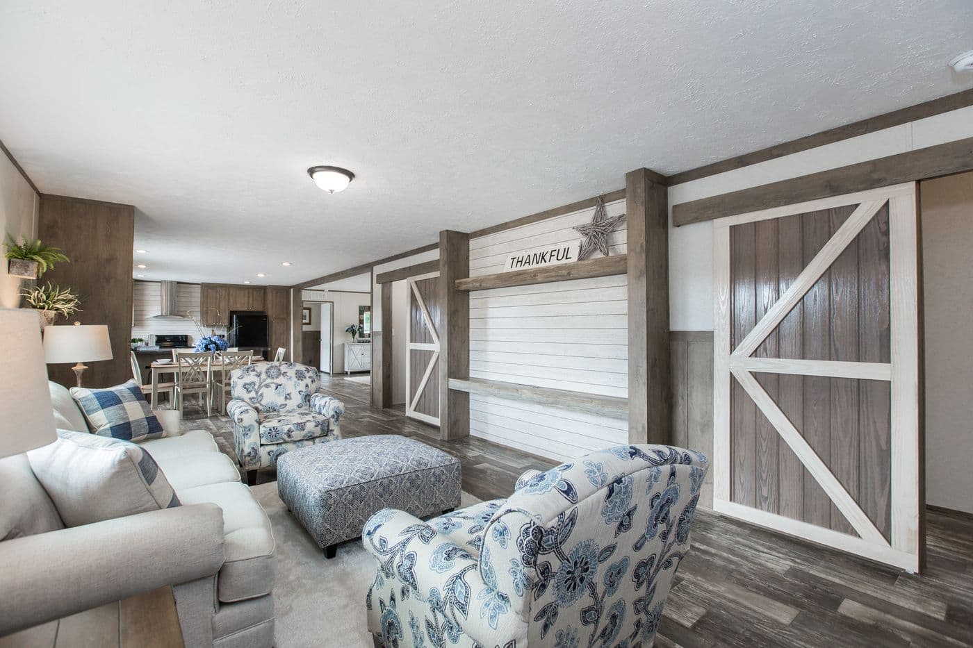 The THE BREEZE 2.5 Living Room. This Manufactured Mobile Home features 4 bedrooms and 2 baths.