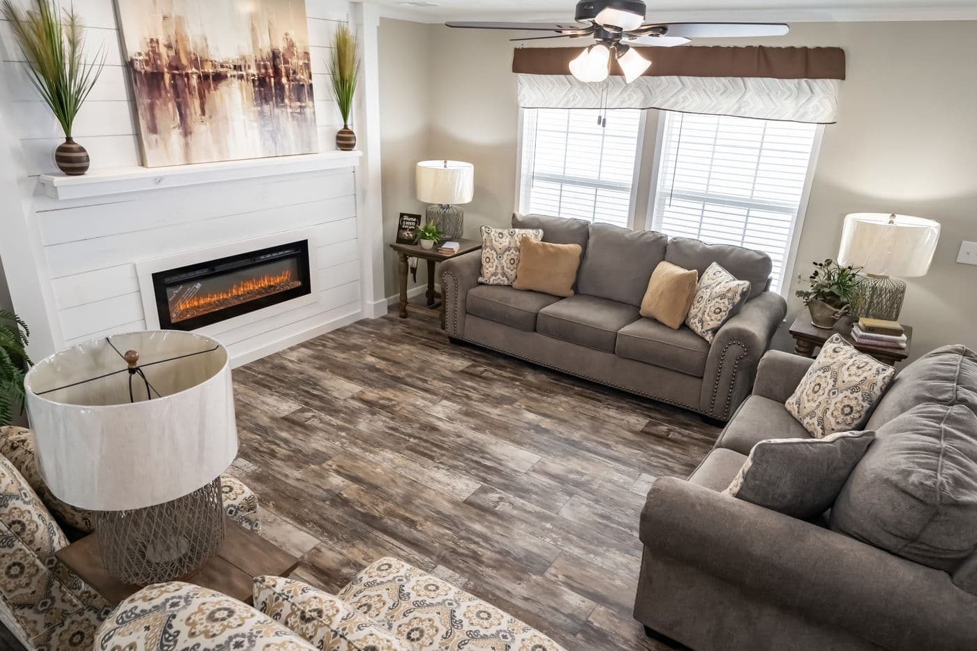 The THE JEFFERSON Living Room. This Manufactured Mobile Home features 3 bedrooms and 3 baths.