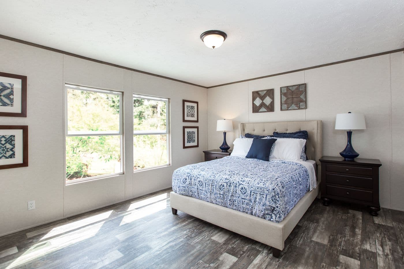 The THE BREEZE 2.5 Primary Bedroom. This Manufactured Mobile Home features 4 bedrooms and 2 baths.
