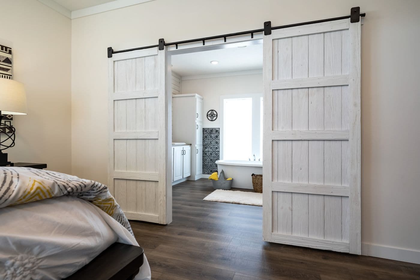 The 1434 CAROLINA "SOUTHERN BELLE" Primary Bedroom. This Manufactured Mobile Home features 3 bedrooms and 2 baths.