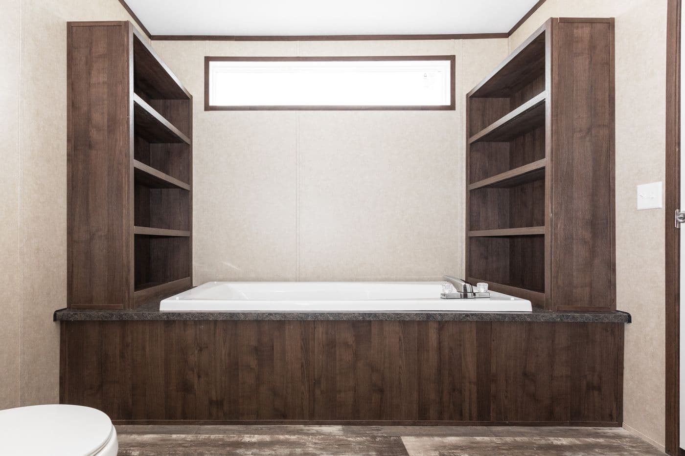 The THE RIVERWAY Primary Bathroom. This Manufactured Mobile Home features 4 bedrooms and 2 baths.