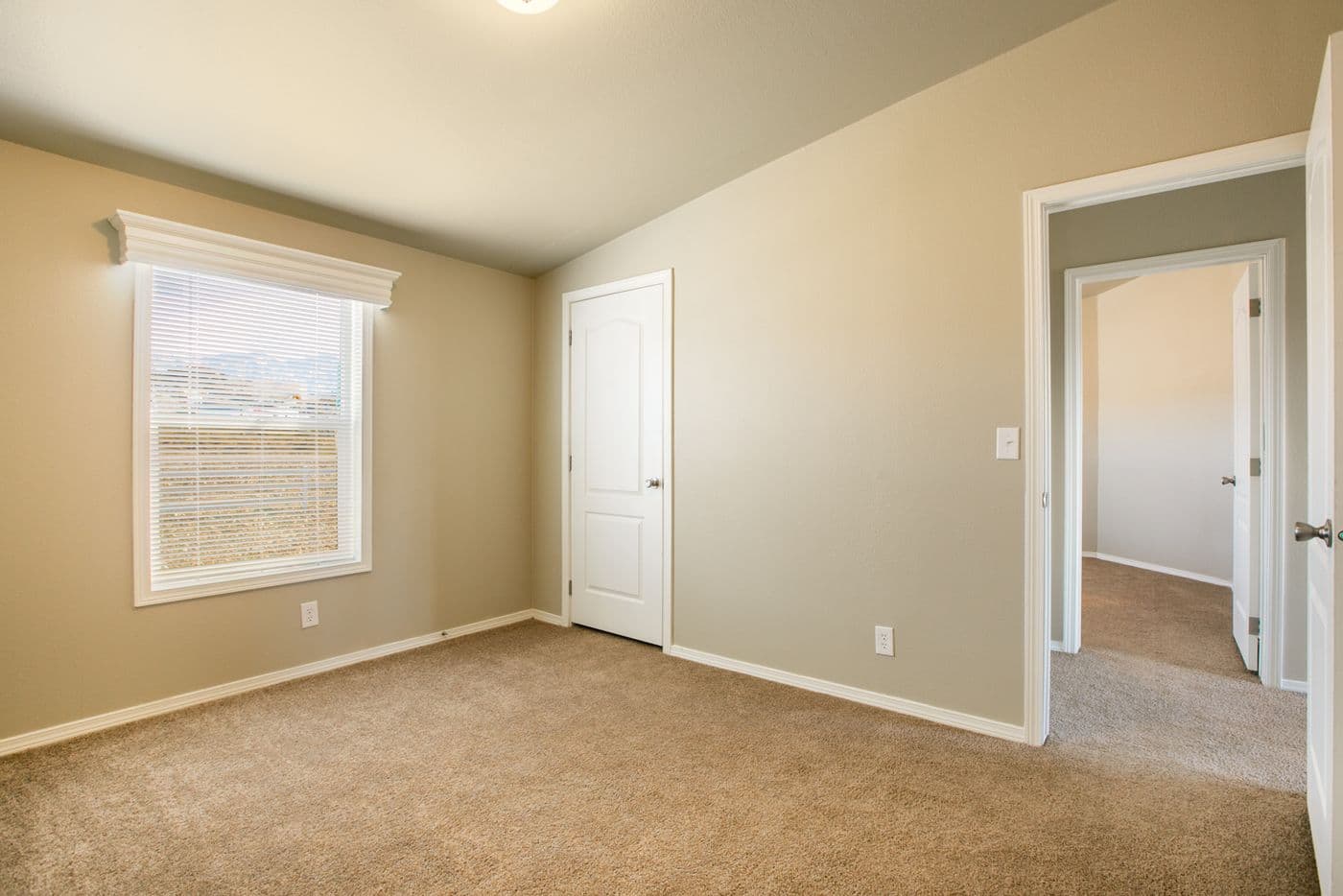 The THE WAVE Guest Bedroom. This Manufactured Mobile Home features 4 bedrooms and 2 baths.