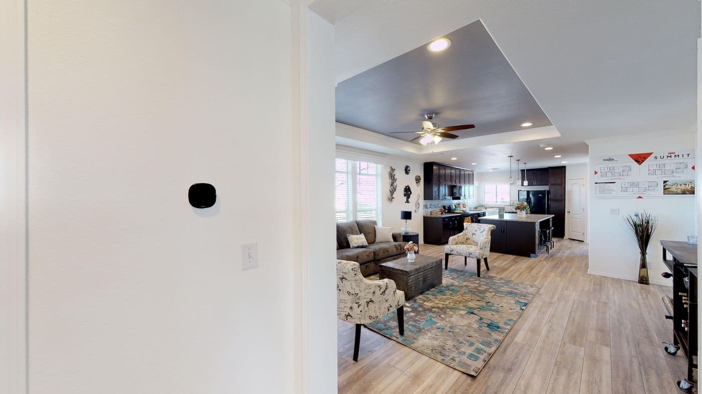 The SUM3068A Living Room. This Manufactured Mobile Home features 3 bedrooms and 2 baths.