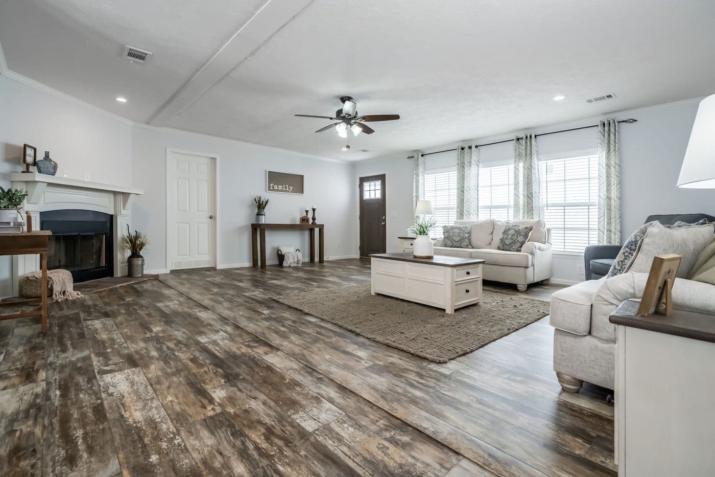 The THE LEAHY Living Room. This Manufactured Mobile Home features 4 bedrooms and 2 baths.