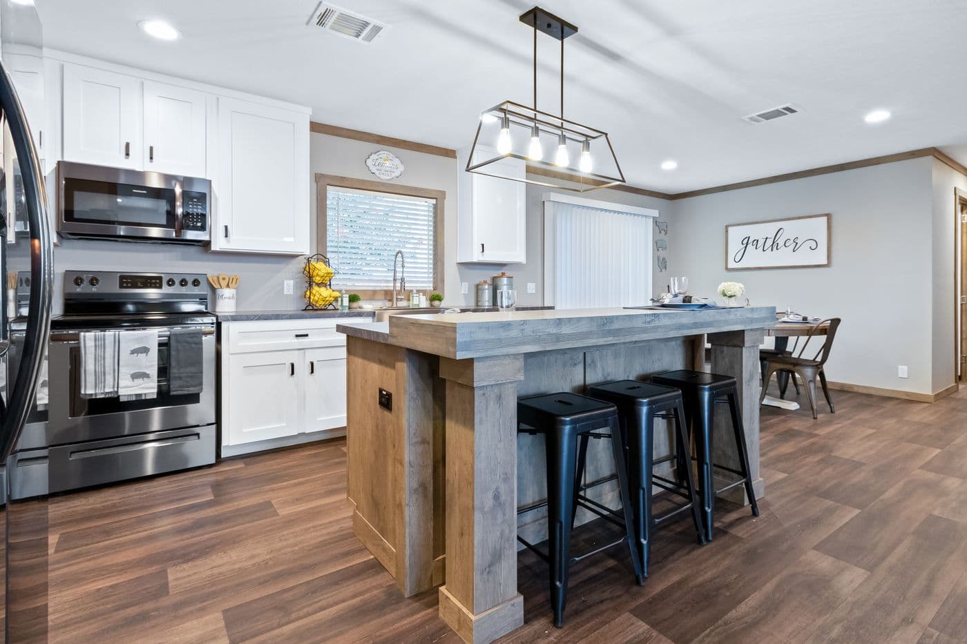 The FARMHOUSE 3 Kitchen. This Manufactured Mobile Home features 3 bedrooms and 2 baths.