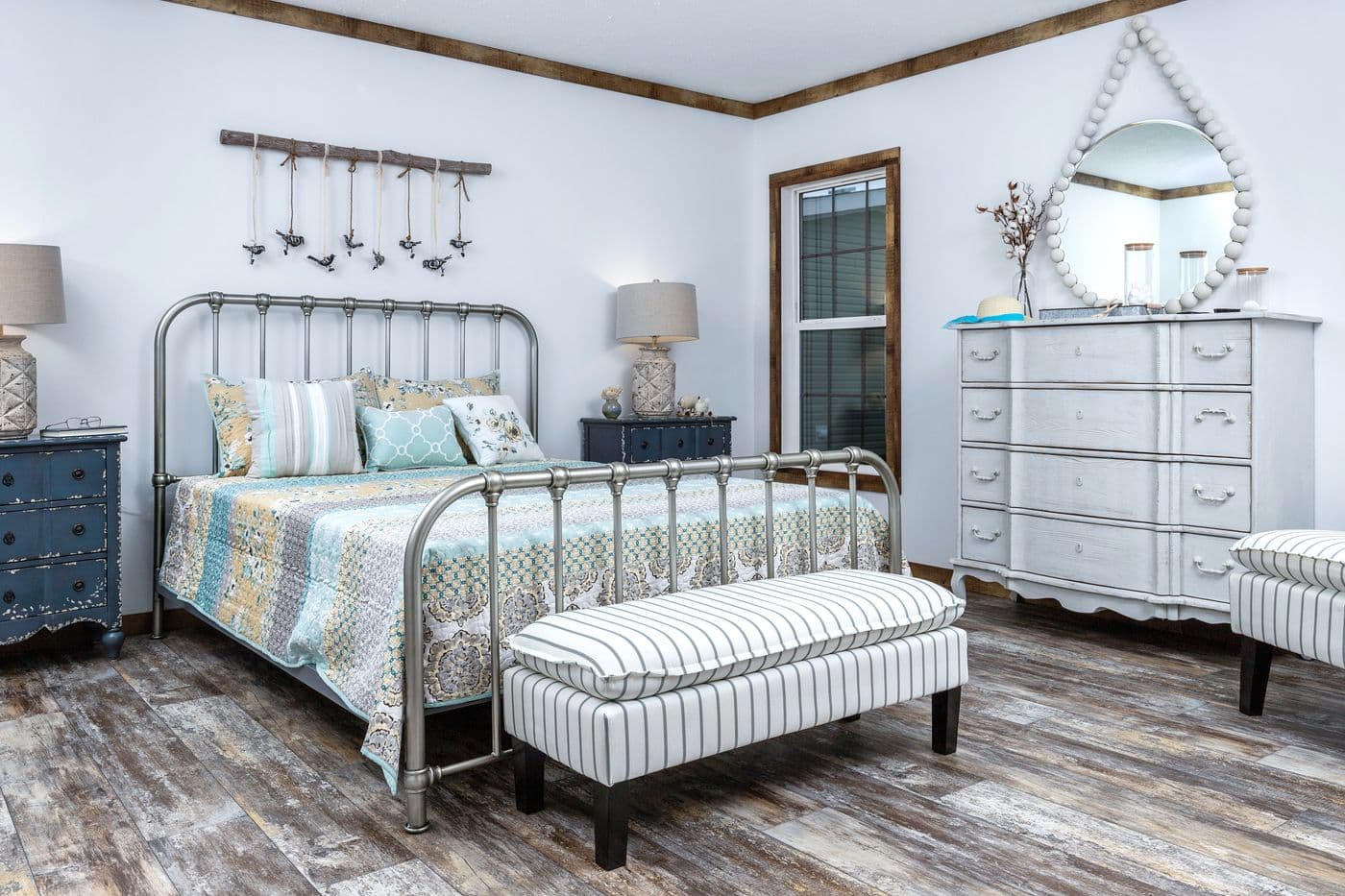 The THE LIZA JANE Primary Bedroom. This Manufactured Mobile Home features 3 bedrooms and 2 baths.
