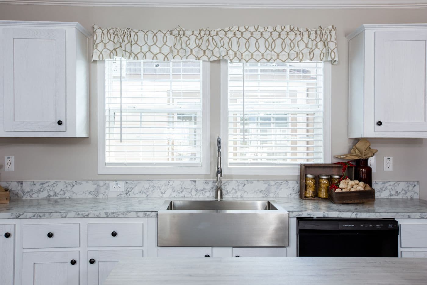 The THE FREEDOM BREEZE Kitchen. This Manufactured Mobile Home features 3 bedrooms and 2 baths.
