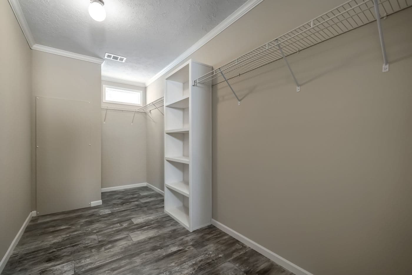 The THE JEFFERSON Storage. This Manufactured Mobile Home features 3 bedrooms and 3 baths.