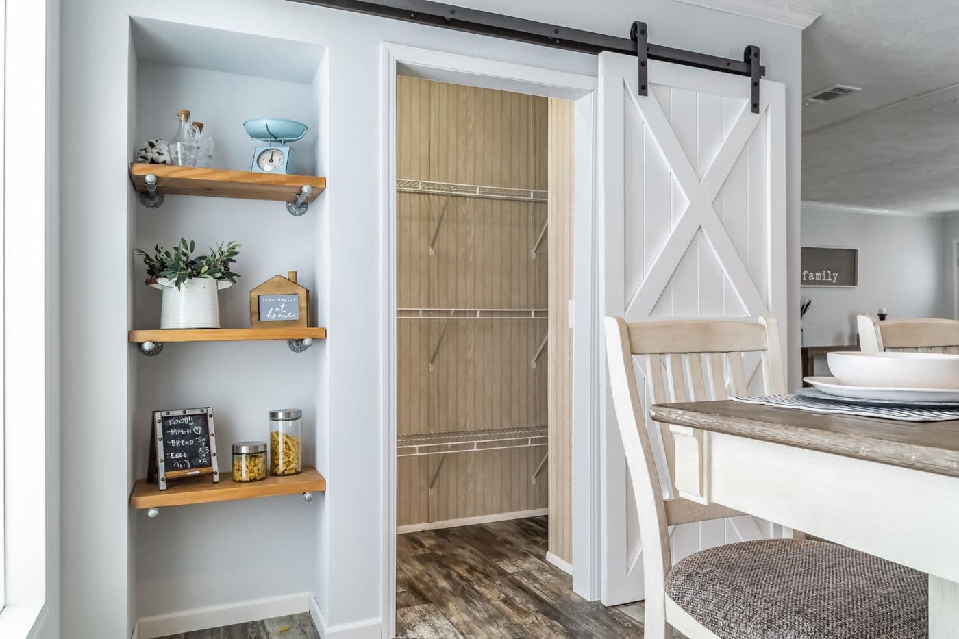 The THE LEAHY Dining Area. This Manufactured Mobile Home features 4 bedrooms and 2 baths.