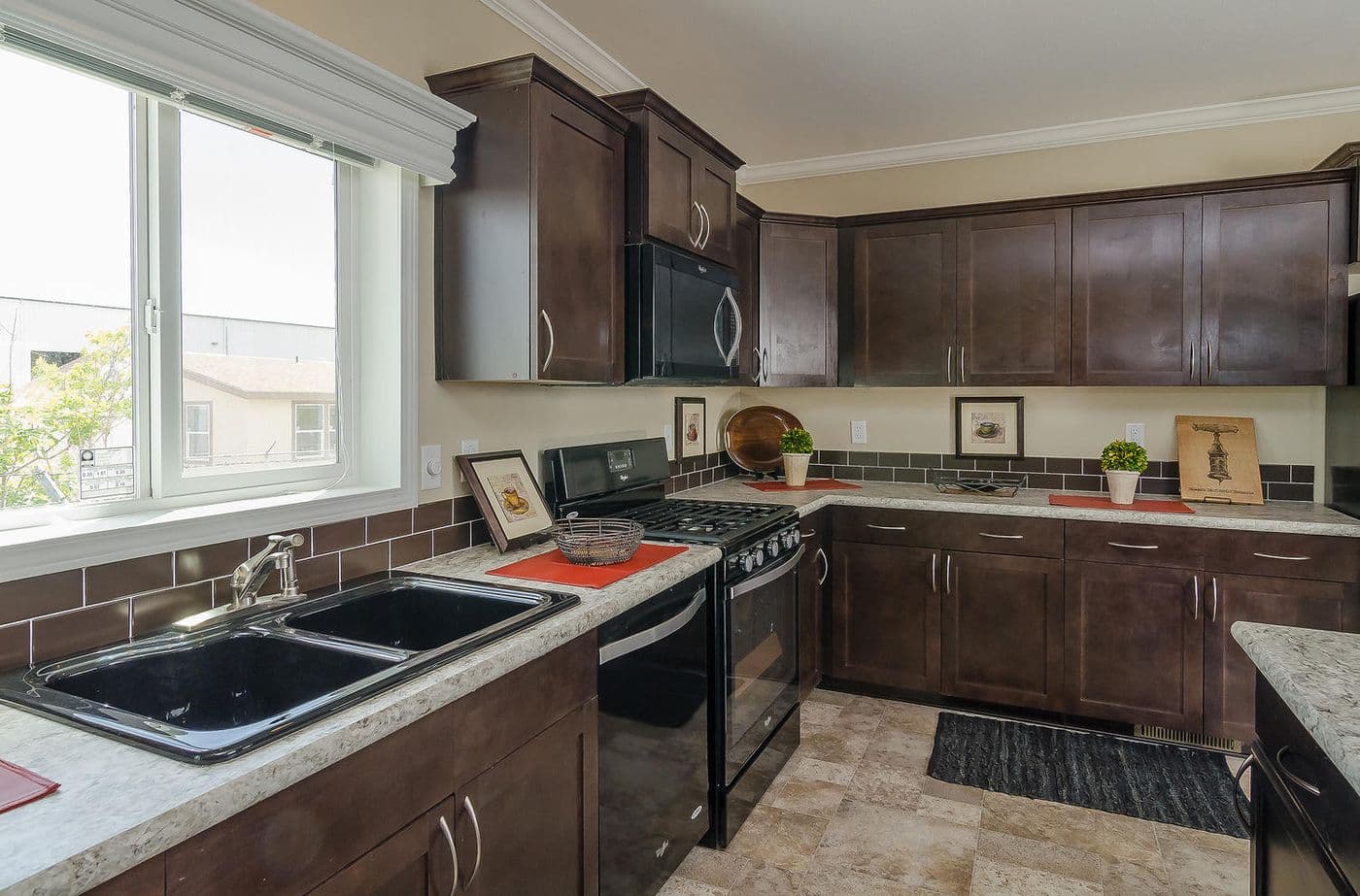 The K3076A Kitchen. This Manufactured Mobile Home features 4 bedrooms and 2 baths.