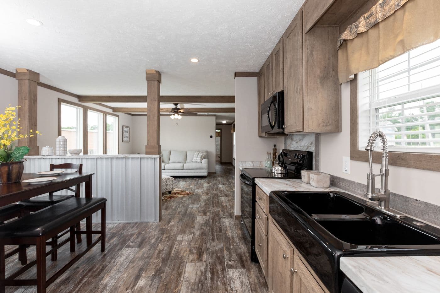 The THE WALSH Kitchen. This Manufactured Mobile Home features 3 bedrooms and 2 baths.