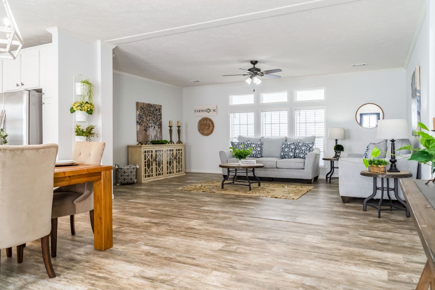 The THE INGRAM Living Room. This Manufactured Mobile Home features 3 bedrooms and 2 baths.
