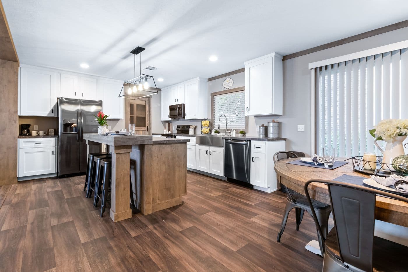 The FARMHOUSE 3 Kitchen. This Manufactured Mobile Home features 3 bedrooms and 2 baths.