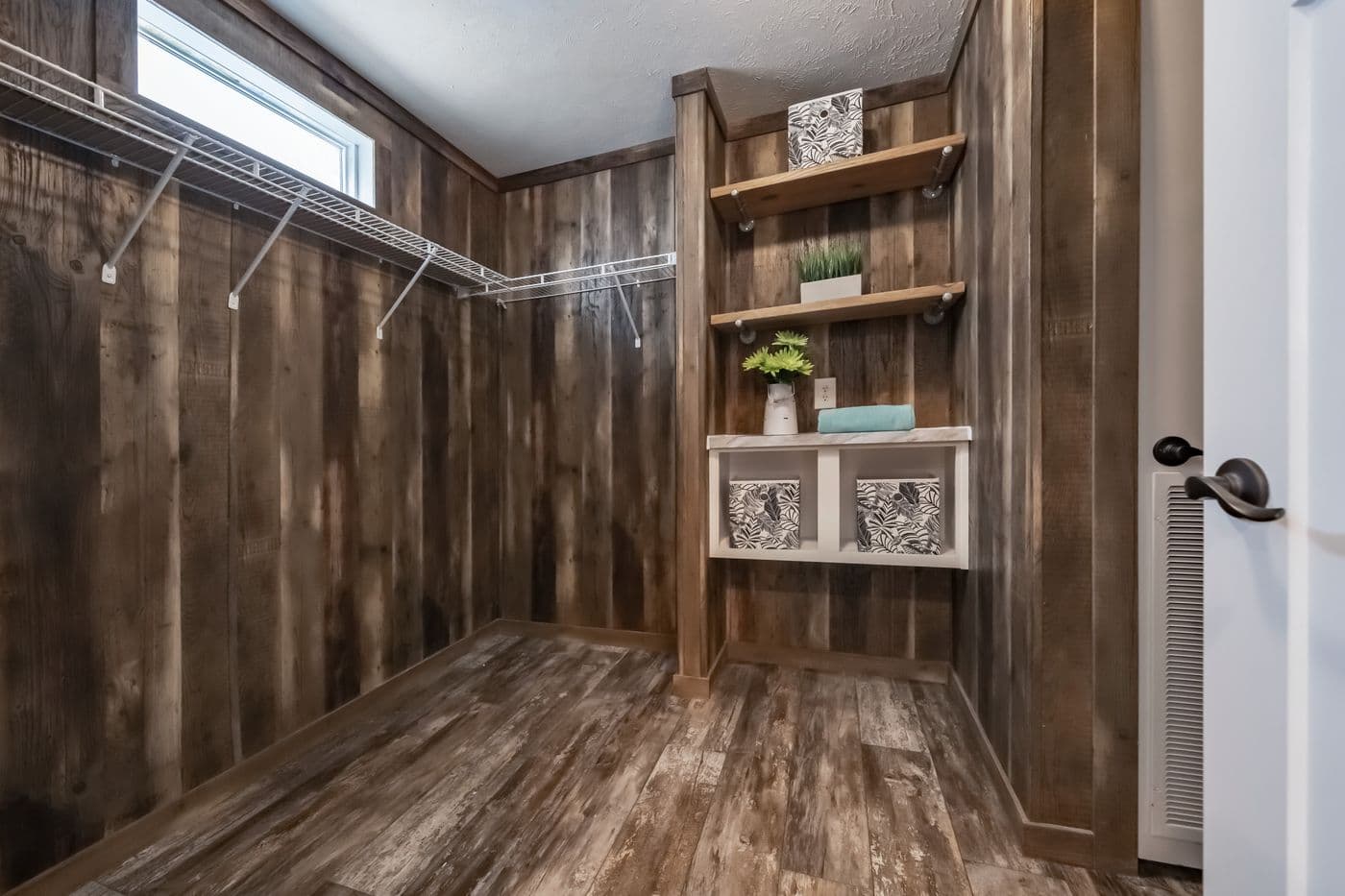 The THE EMMA JEAN Storage. This Manufactured Mobile Home features 4 bedrooms and 3 baths.