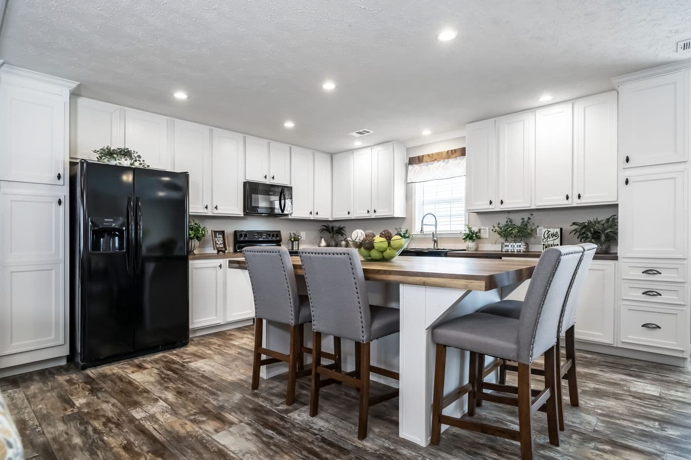 The THE JEFFERSON Kitchen. This Manufactured Mobile Home features 3 bedrooms and 3 baths.