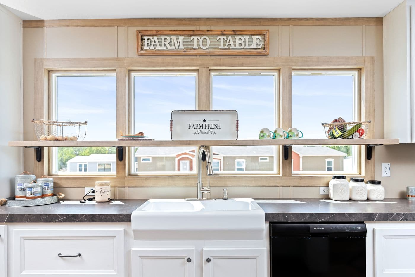 The FARMHOUSE FLEX Kitchen. This Manufactured Mobile Home features 3 bedrooms and 2.5 baths.