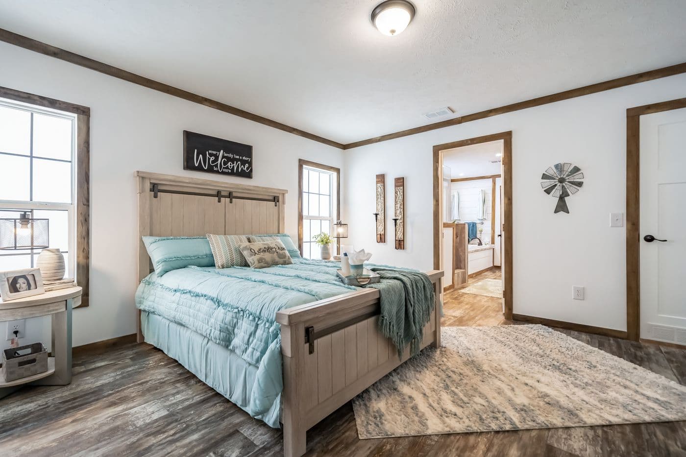 The THE EMMA JEAN Primary Bedroom. This Manufactured Mobile Home features 4 bedrooms and 3 baths.