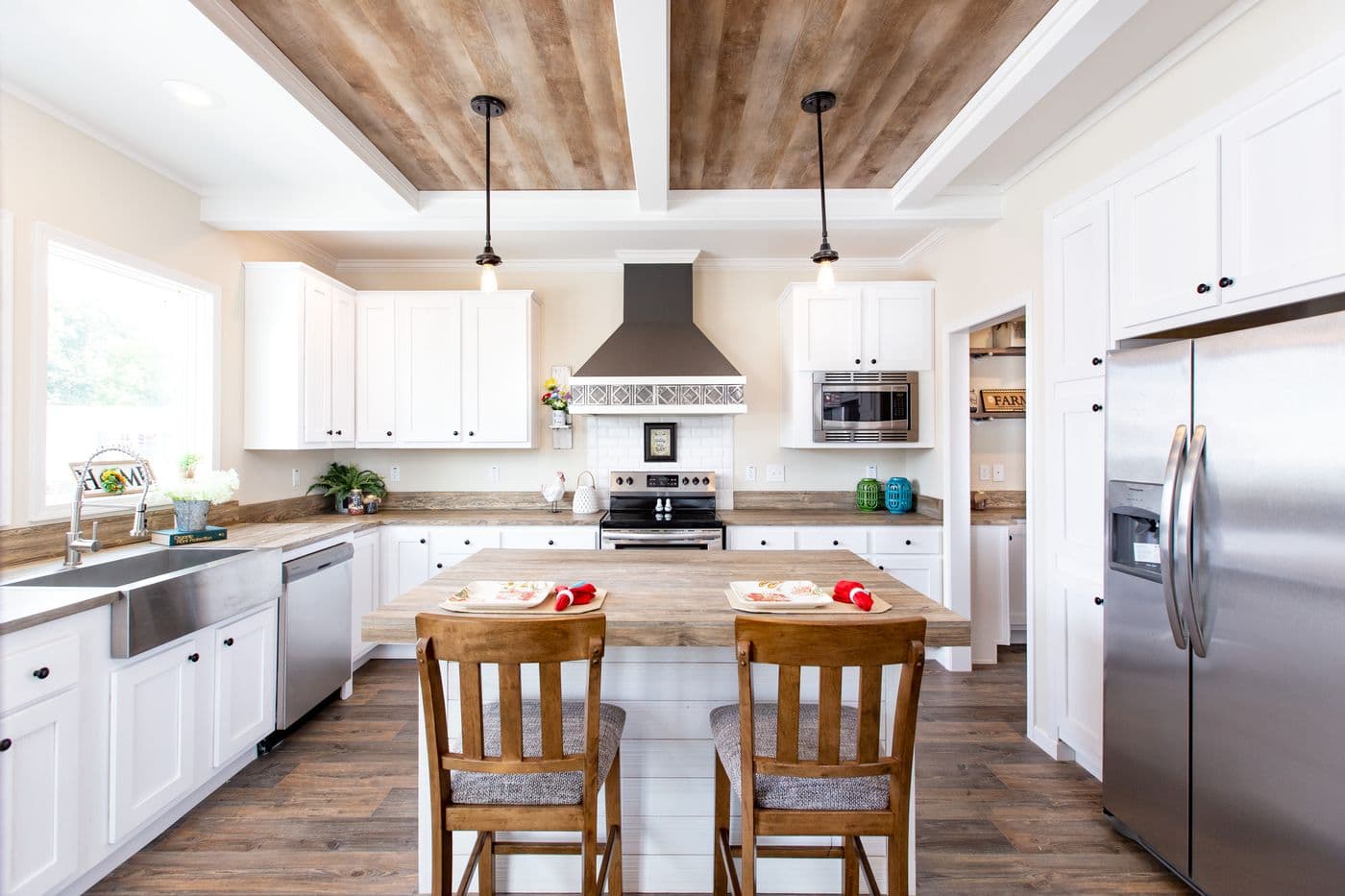 The SOUTHERN CHARM Kitchen. This Manufactured Mobile Home features 3 bedrooms and 2 baths.