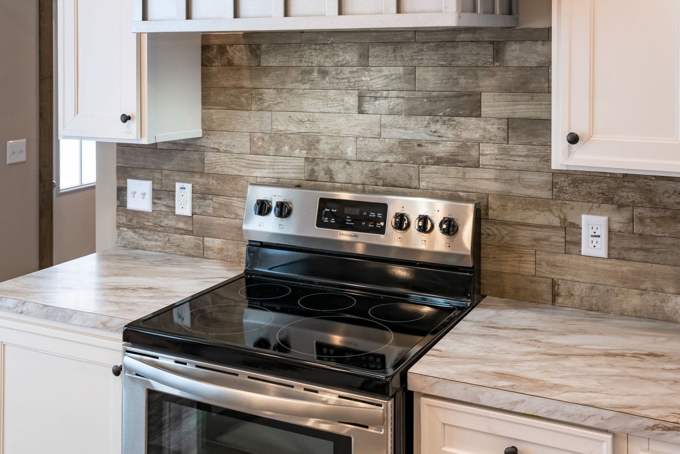 The THE BOBBY JO Kitchen. This Manufactured Mobile Home features 3 bedrooms and 2 baths.