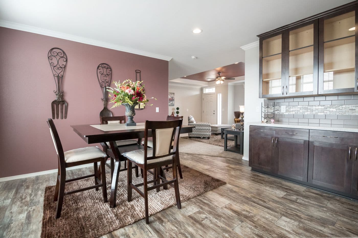 The ENCHANTMENT 3070A Dining Area. This Manufactured Mobile Home features 3 bedrooms and 2 baths.