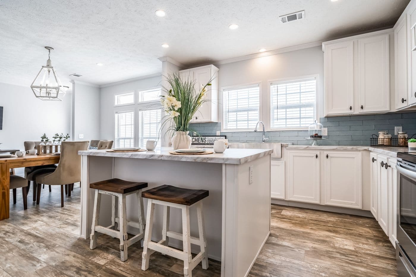 The THE INGRAM Kitchen. This Manufactured Mobile Home features 3 bedrooms and 2 baths.