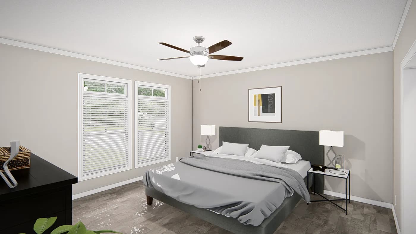 The THE RIVIERA Primary Bedroom. This Manufactured Mobile Home features 4 bedrooms and 2 baths.