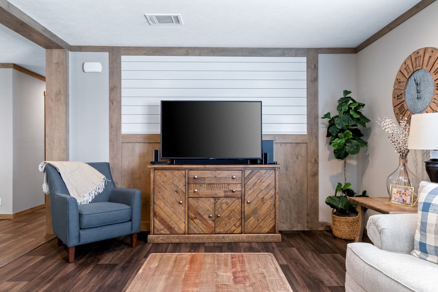 The FARMHOUSE 3 Living Room. This Manufactured Mobile Home features 3 bedrooms and 2 baths.