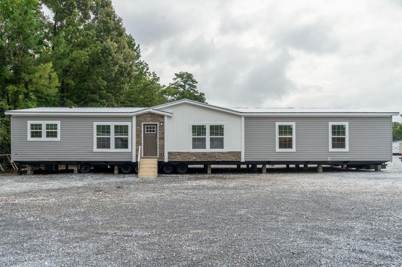 The THE CAROLINA Exterior. This Manufactured Mobile Home features 4 bedrooms and 2 baths.