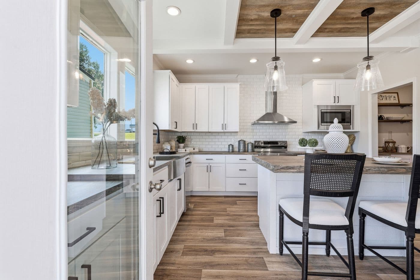 The SOUTHERN CHARM Exterior. This Manufactured Mobile Home features 3 bedrooms and 2 baths.