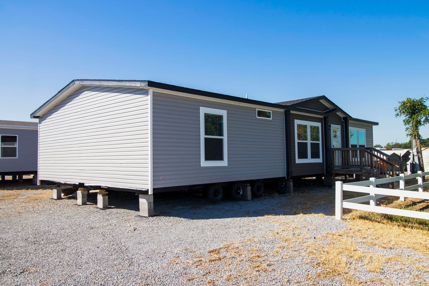 The THE BIG DEAL 52 Exterior. This Manufactured Mobile Home features 3 bedrooms and 2 baths.